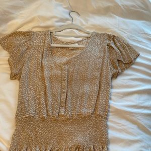 This is a cheers print blouse and is a size small